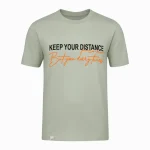 تیشرت مردانه keep your distance رنگ مغز پسته ای روشن