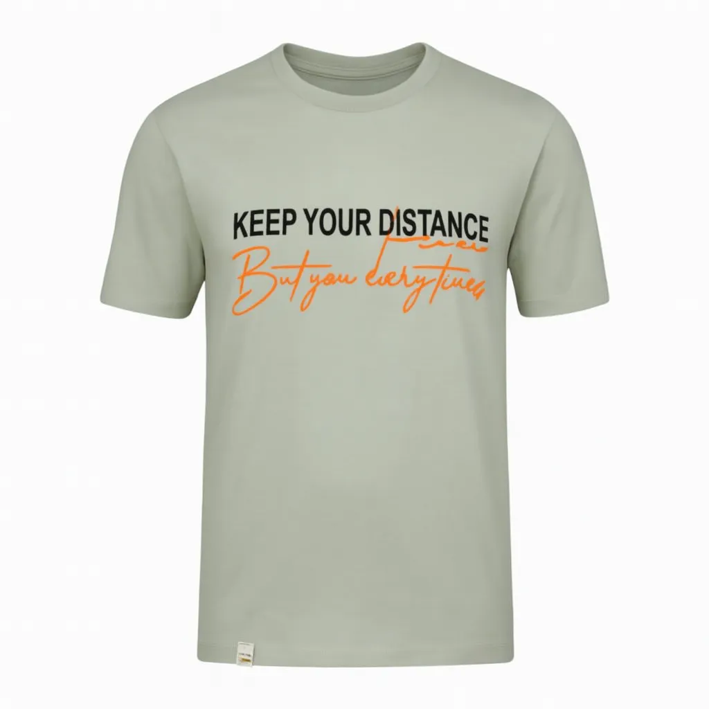 تیشرت مردانه keep your distance رنگ مغز پسته ای روشن