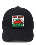 کلاه کپ مشکی کیت هرینگ (Keith Haring) طرح سیب نیویورک